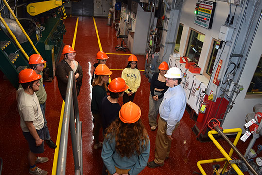 Students touring heat plant