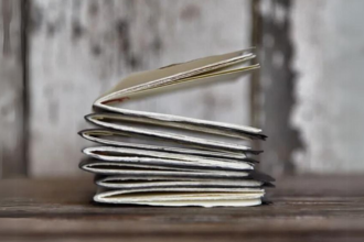 Handmade journals stacked on top of each other