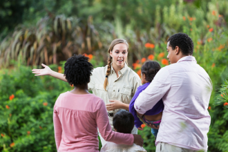 garden tour guide and family