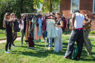 Students at outdoor clothing swap