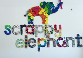Scrappy Elephant sign using buttons and art scraps