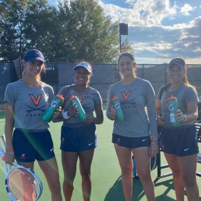UVA Student athletes with reusable water bottles